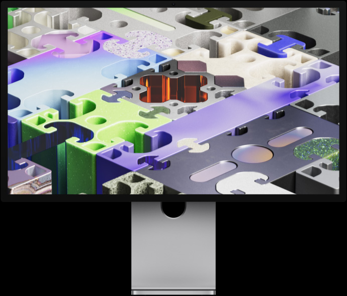 Parte da frente do Studio Display XDR com uma imagem de fundo tridimensional semelhante a um quebra-cabeça